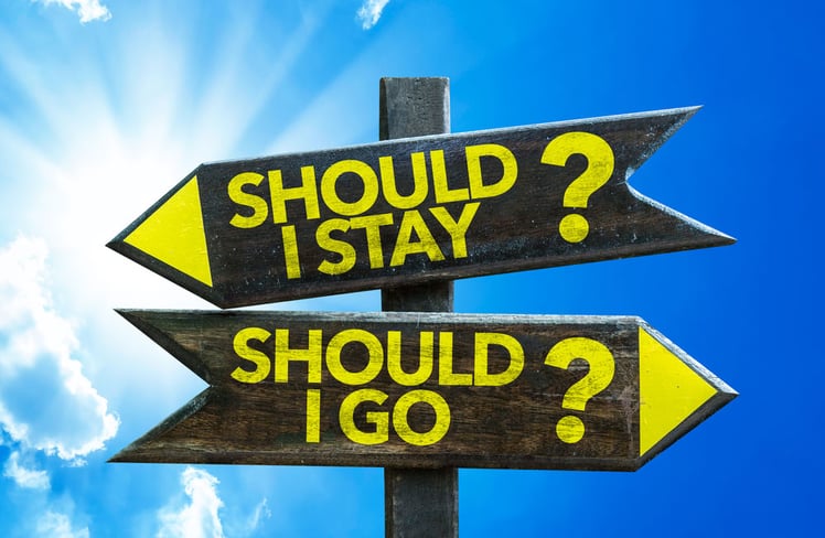 Should-I-Stay-Should-I-Go-signpost-with-sky-background