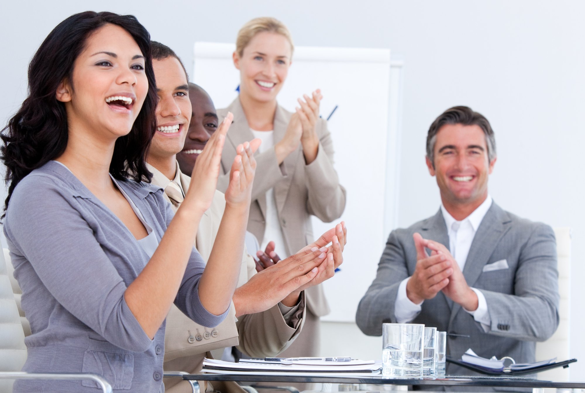 Cheerful business applauding in a meeting