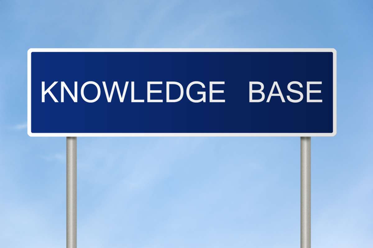 A blue road sign with white text saying Knowledge Base