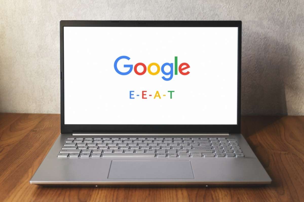 A computer screen shows Google E-A-T on a white background for AI-generated content
