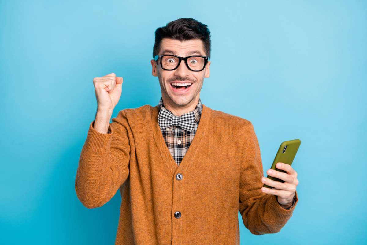 A nerd excited about a mobile search, property management marketing success concept