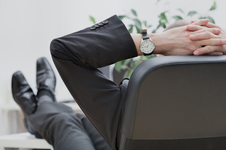 Businessman at the end of the work in his office