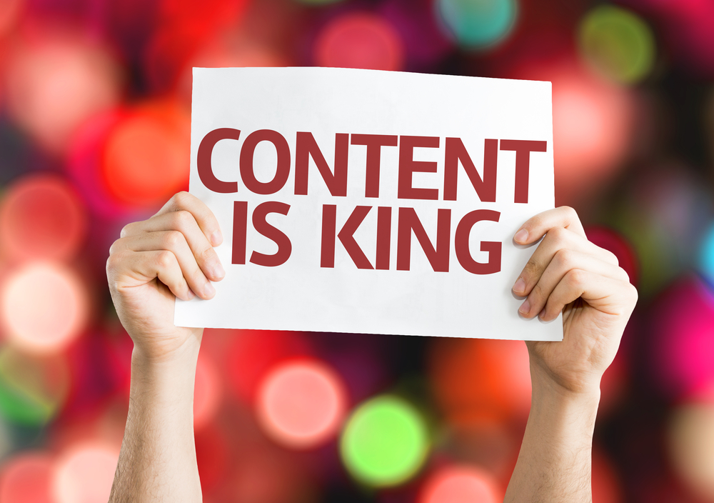 Content is King card with colorful background with defocused lights-1