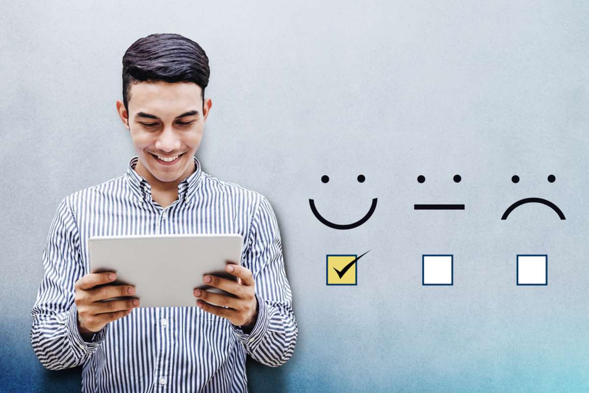 Customer Experience Concept, Happy Businessman holding digital Tablet