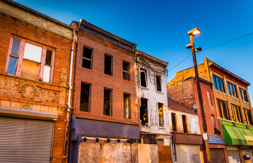 Evening light on abandoned buildings at Old Town Mall, Baltimore, Maryland.