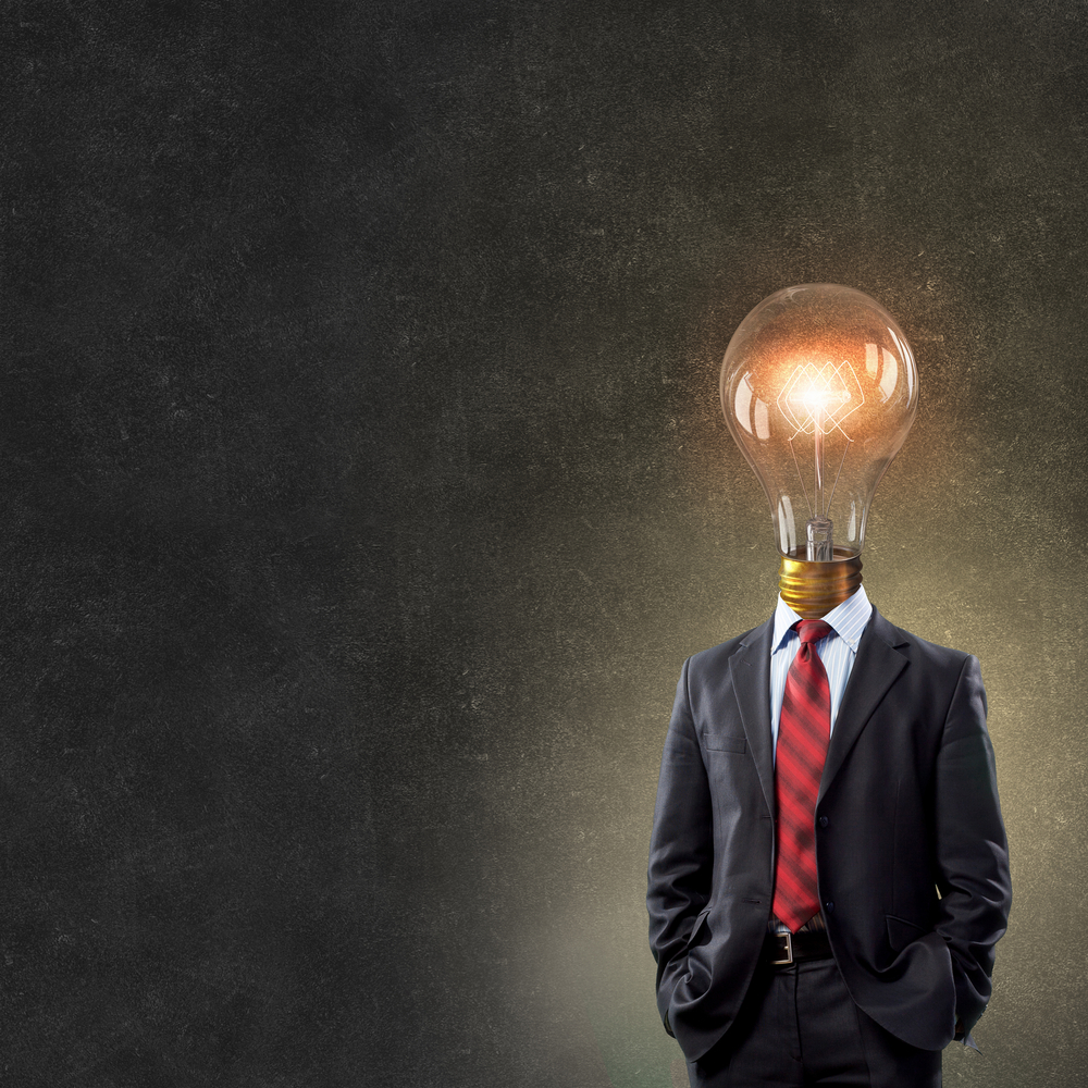 Head as a lightbulb for ideas, how to come up with blog post ideas concept. 