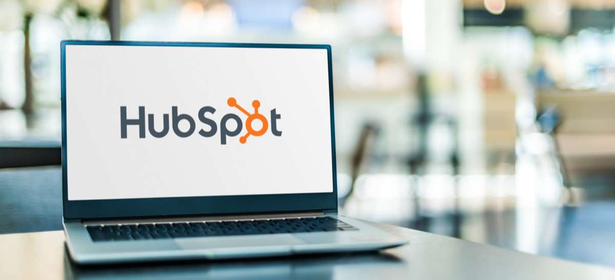Laptop computer displaying logo of HubSpot