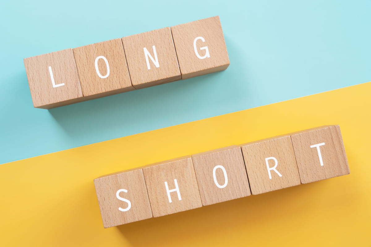 Long and short spelled in blocks, long-term content marketing strategy concept