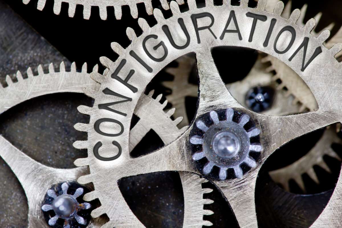Macro photo of tooth wheel mechanism with CONFIGURATION concept letters