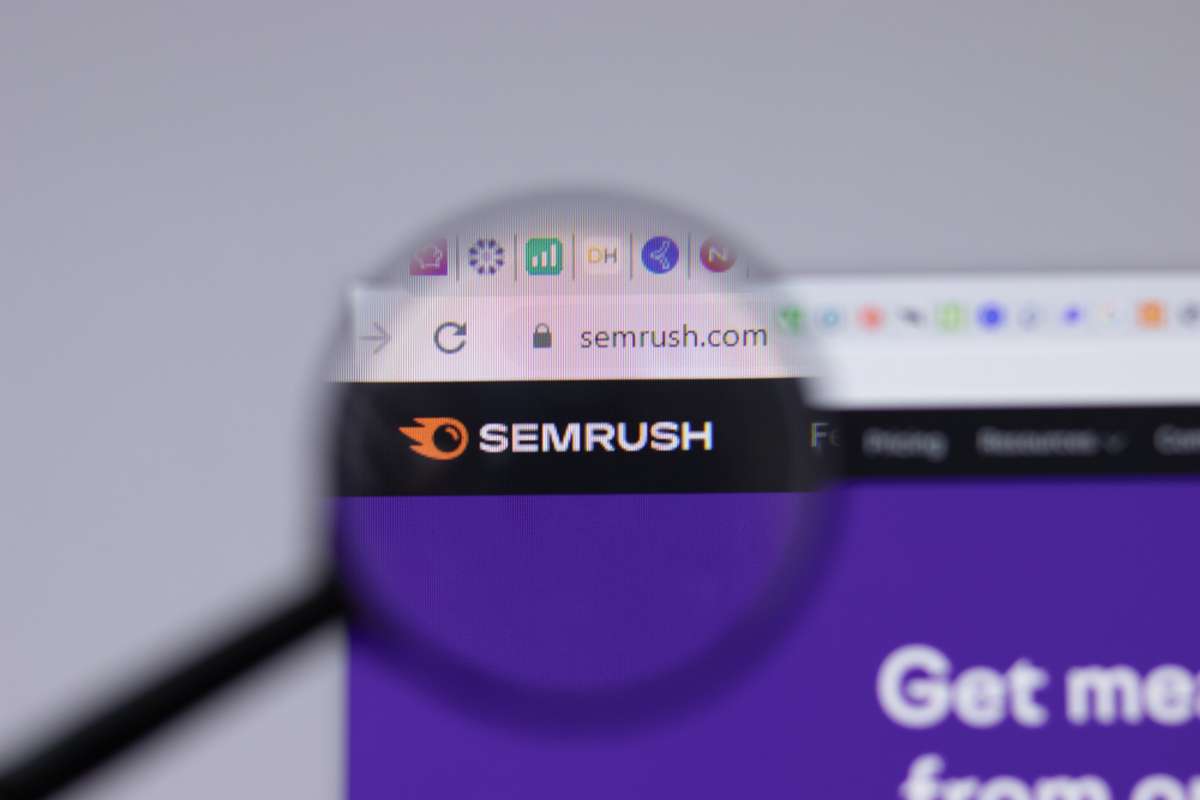 Magnified SEMrush logo on a computer screen, AI marketing tools concept-1