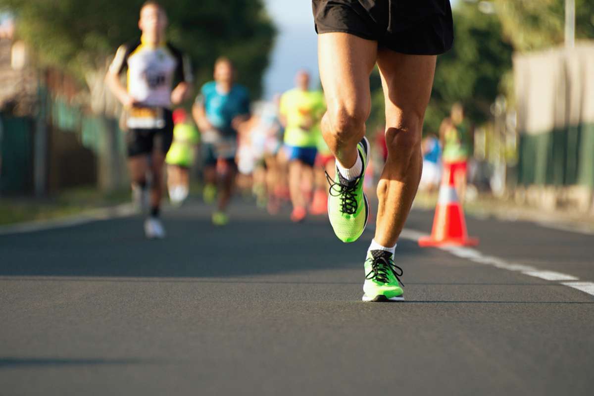Marathon runners on the street, content marketing strategies concept