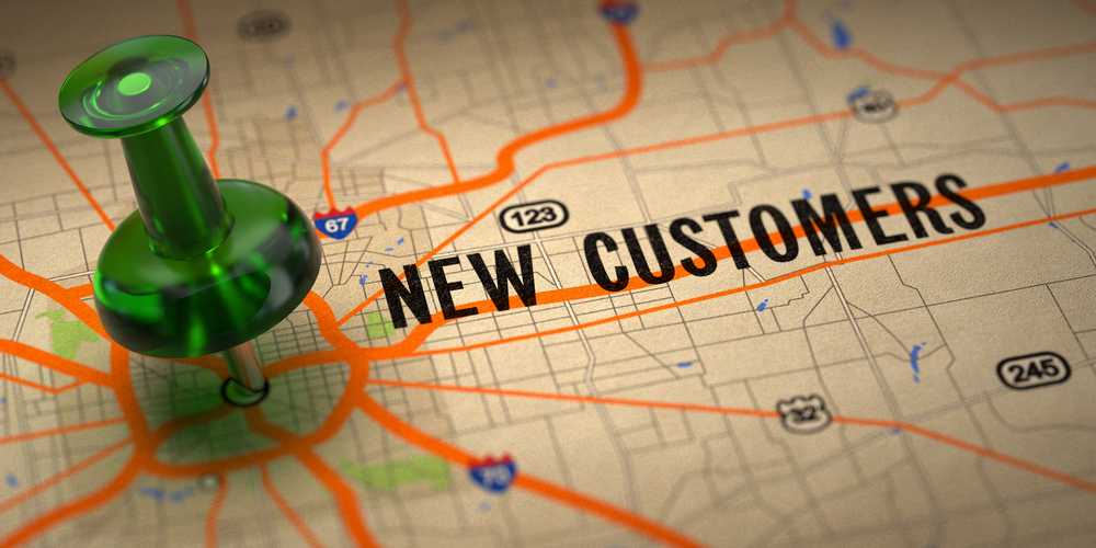 Green Pushpin on a Map Background with Selective Focus on New Customers, property management marketing success concept. 