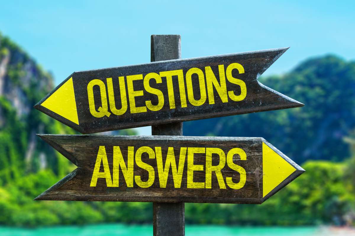 Questions Answers signpost in a beach background, what is inbound marketing concept.