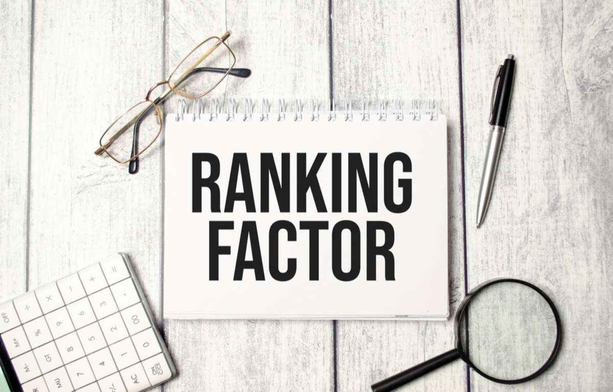 SEO ranking factors in black type on a notepad