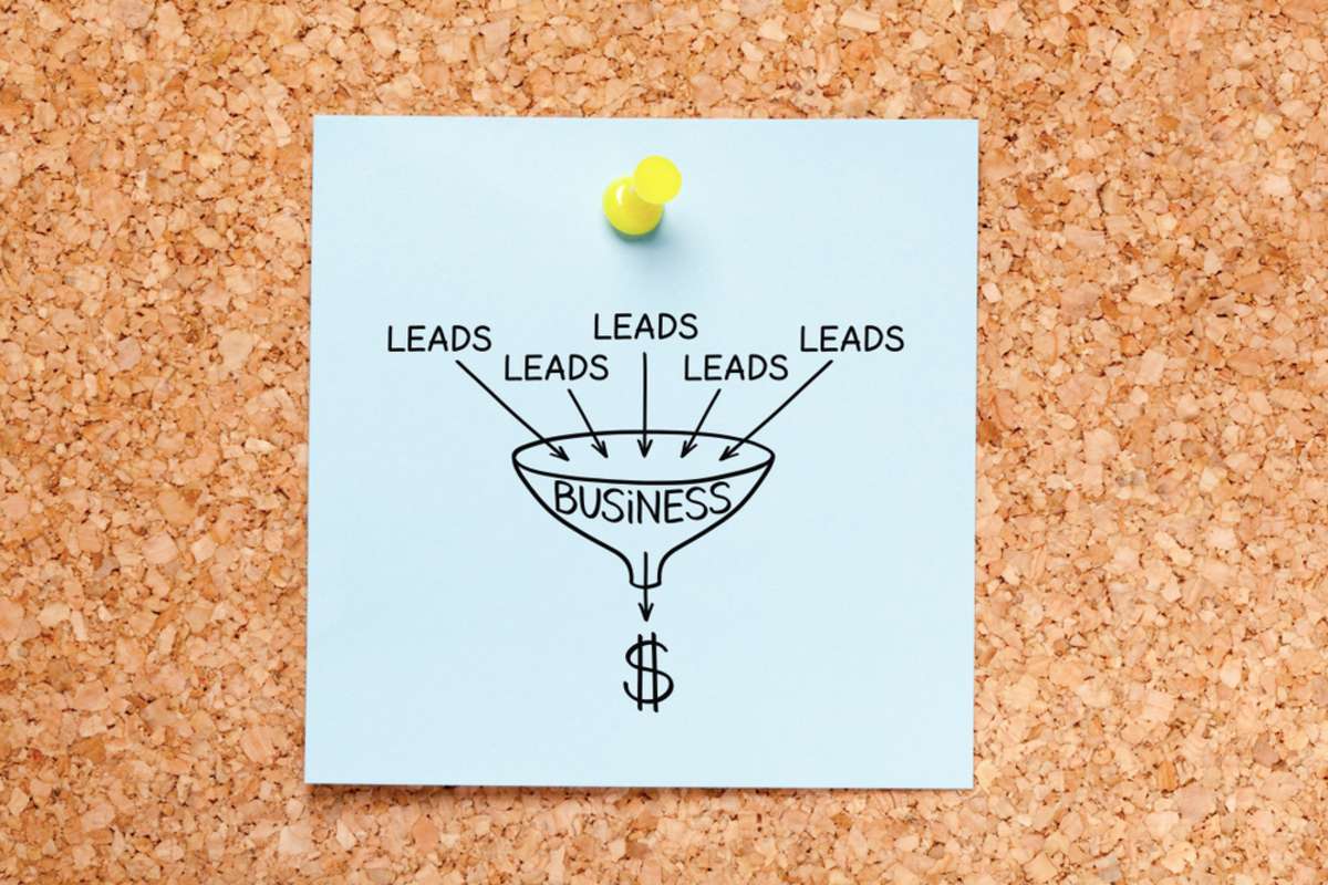 Sales funnel lead generation business concept drawn on blue sticky note pinned on cork bulletin board