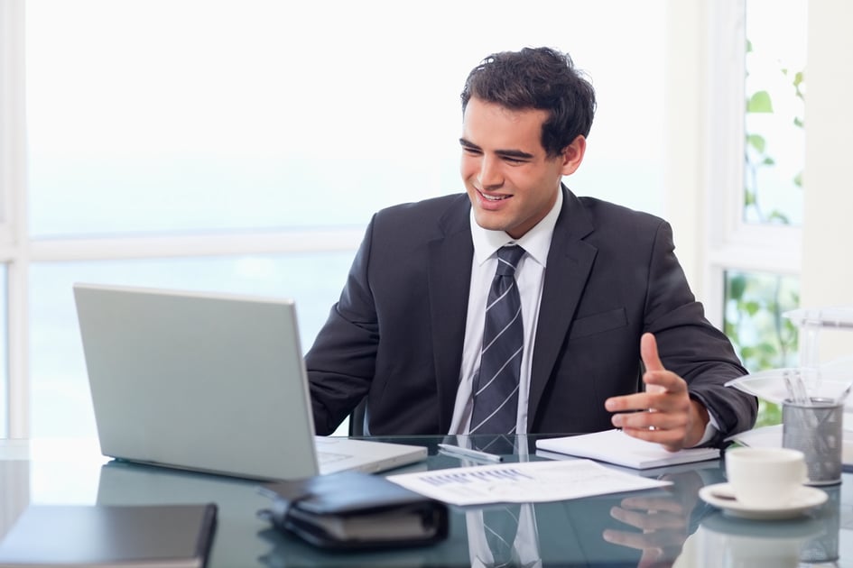 Upset businessman during a video conference in his office