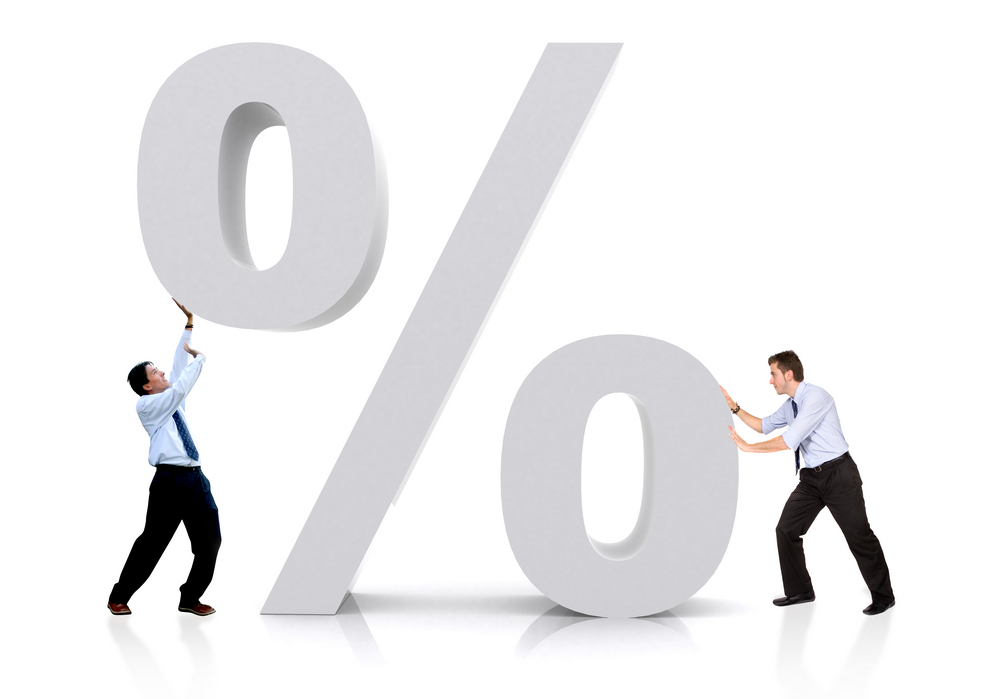business men with a percentage sign isolated over a white background