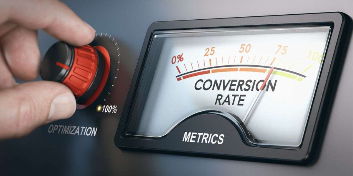 Hand turning optimization knob up to 100 percent and dial indicating conversion rate metrics